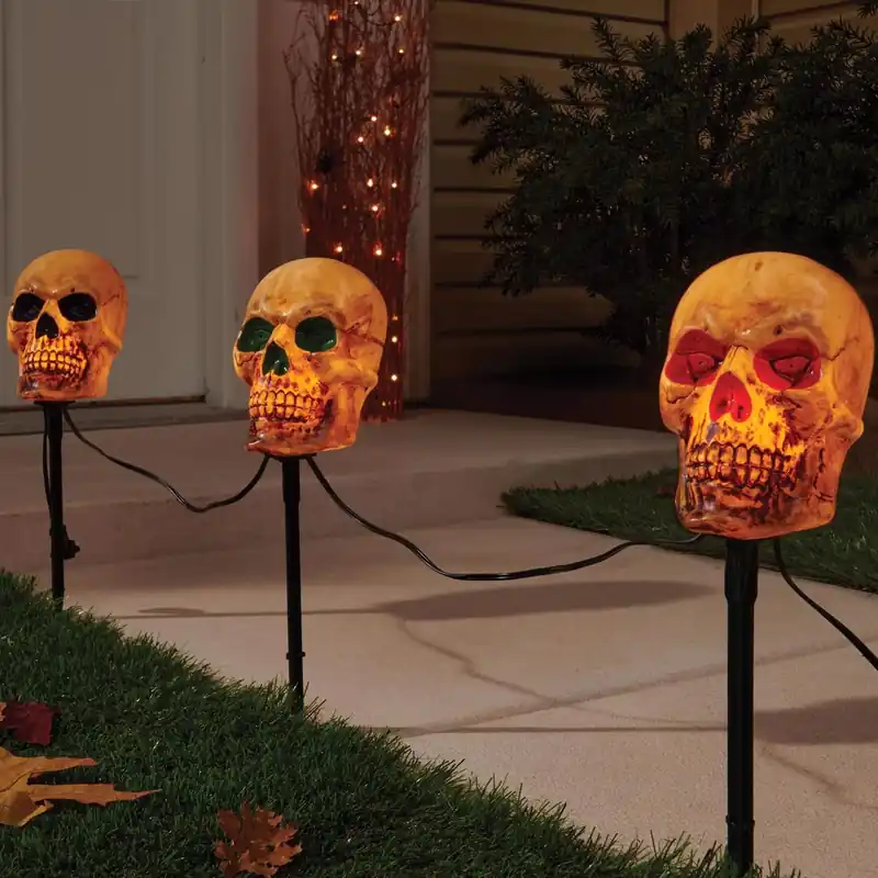 Clear 6 In. Incandescent Halloween Skull Pathway Decor - 3 Piece Set